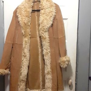 A WILSON LEATHER COAT SIZE LARGE